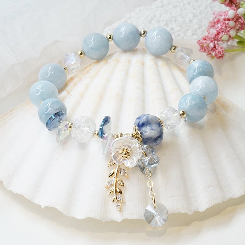 Sky Blue Beaded Bracelet With Flower Charms And Gold/Crystal Accents - Turquoise Trading Co